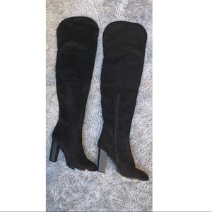 Black, suede, thigh high boots.